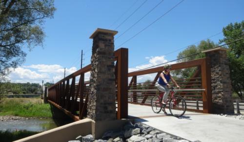 27. Wheat Ridge cyclist crossing new Kipling Bridge 