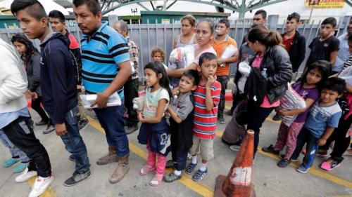 Immigrant families lined up to enter the central bus station after they were processed and released by U.S. Customs and Border Protection last month.